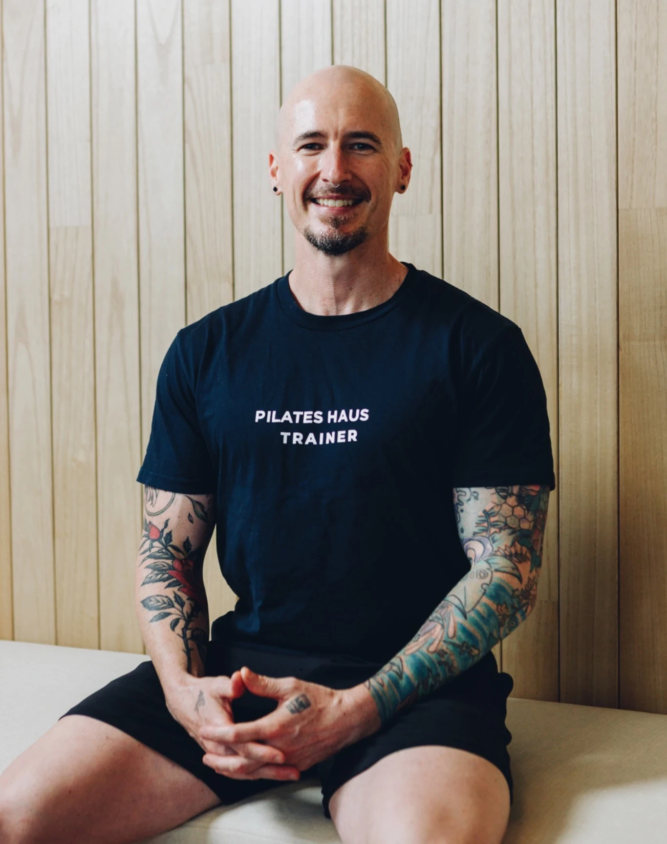 Shannon seated in the Pilates Haus studio